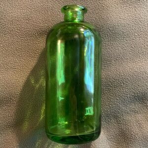 Beautiful green bottle/vase. Approximately 10” x 4”. Mouth approximately 1”.